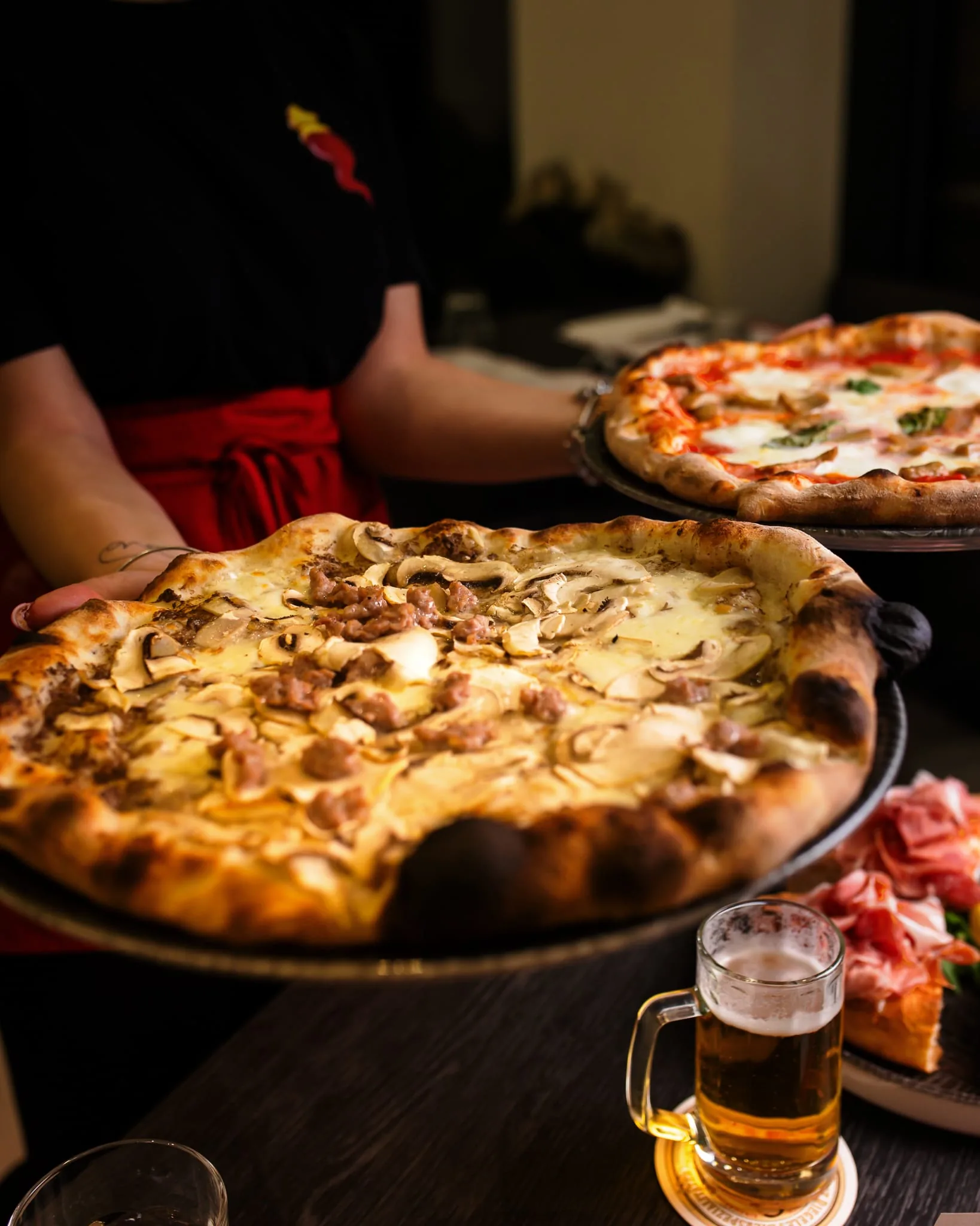 Pizza e prodotti de Il Cornicello pronti al tavolo